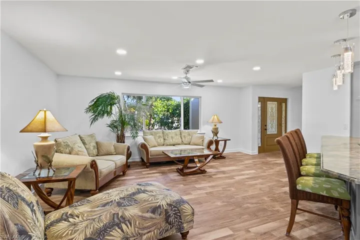 Welcoming entryway leading into a light-filled living room—perfect for everyday living and entertaining.