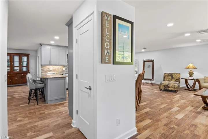 Beautifully designed entryway creating a welcoming first impression with views into the main living area.
