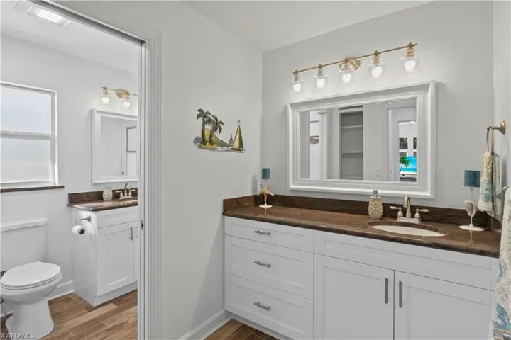 Elegant guest bathroom with high-end finishes and a calming, refined atmosphere.