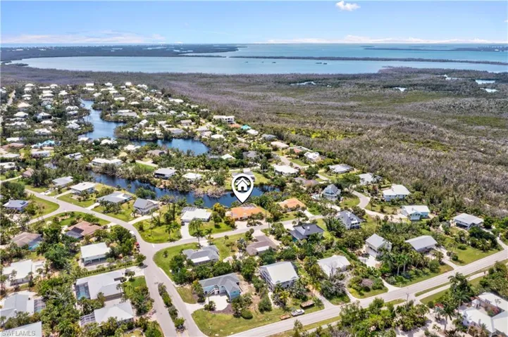 Expansive aerial perspective highlighting the home’s prime location in Gumbo Limbo and proximity to Sanibel’s beaches.