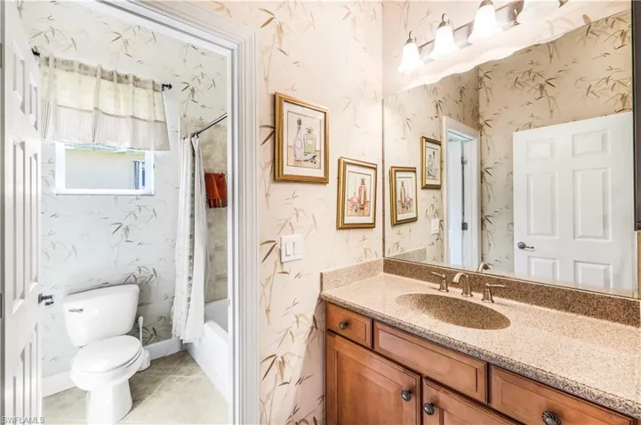 2nd Full bathroom with vanity, shower / bath combo, is shared by the 2nd and 3rd bedroom.