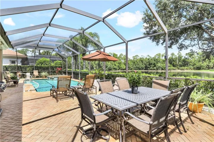 Sunroom with a water view
