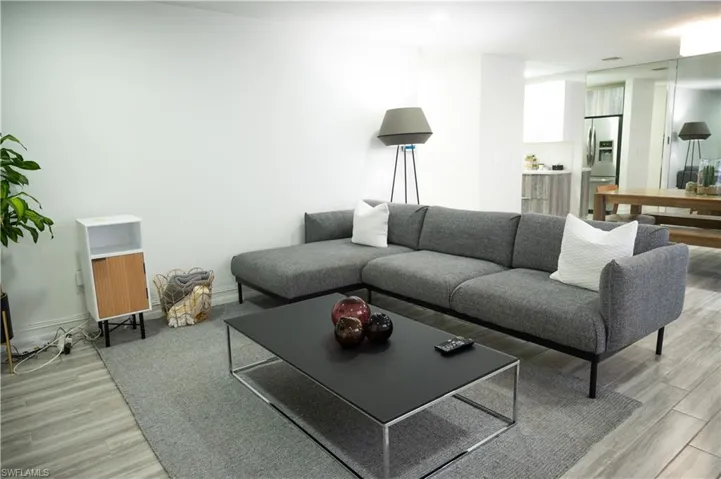 Living area with light wood-style flooring