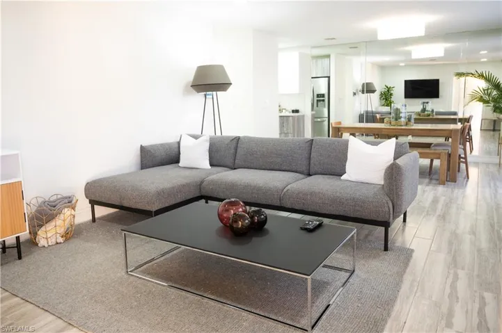Living area with light wood finished floors