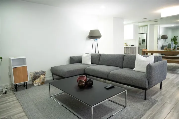 Living area with light wood-style floors