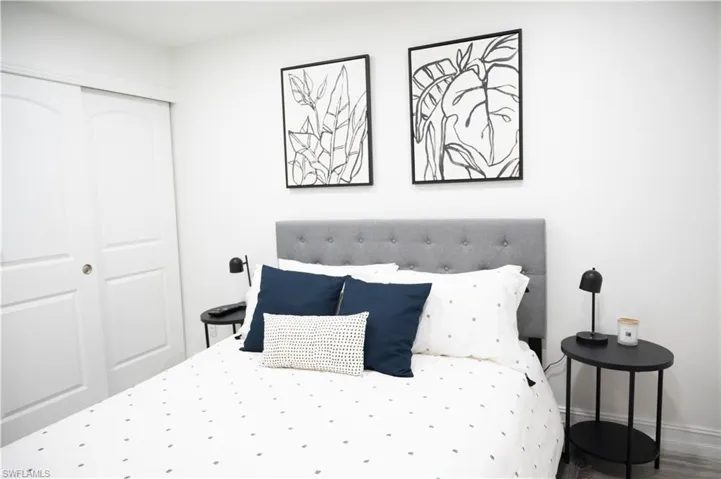 Bedroom featuring a closet and baseboards