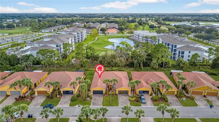 Aerial view of a nearby body of water and a golf course