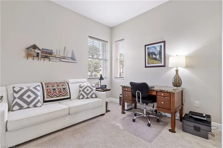 Office area featuring light colored carpet