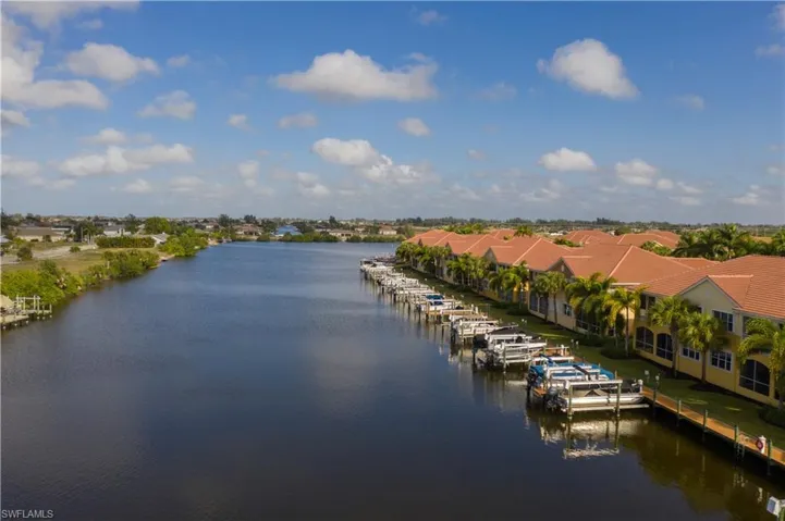 Water view featuring a dock