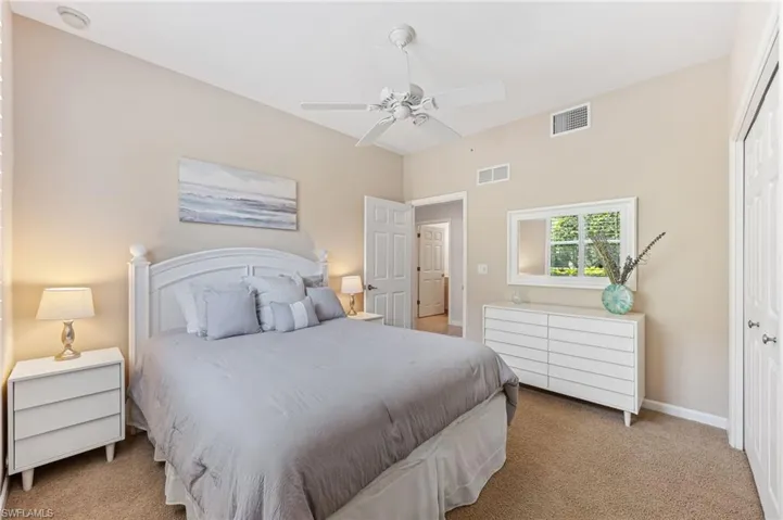 Bedroom featuring carpet flooring and ceiling fan
