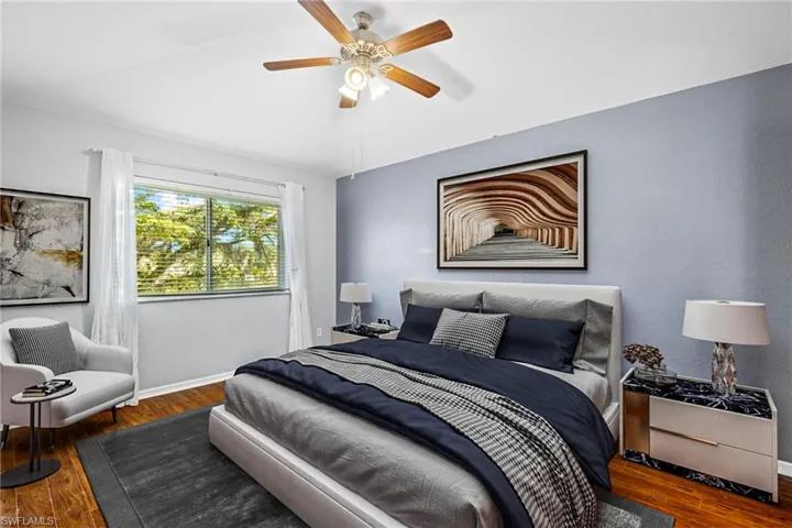 VIRTUALLY STAGED -Bedroom with dark hardwood / wood-style flooring and ceiling fan