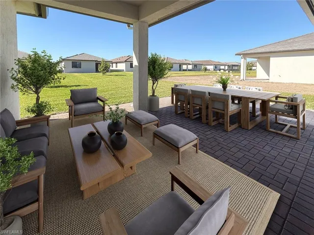 View of patio featuring outdoor dining area and a residential view