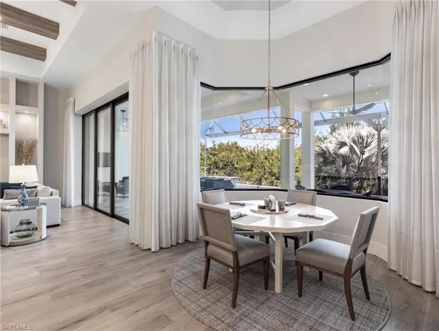 Dining space with light wood-type flooring