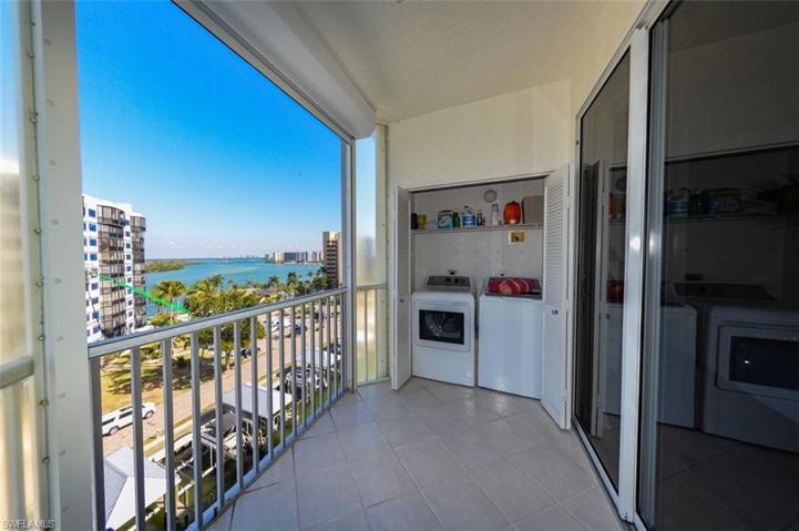 ESTERO BAY VIEWS FROM THE CONVENIENT LAUNDRY.  ELECTRIC SHUTTERS.