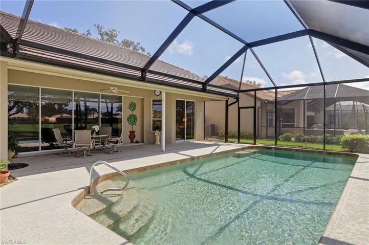 Pool area looking back at the rear of the house