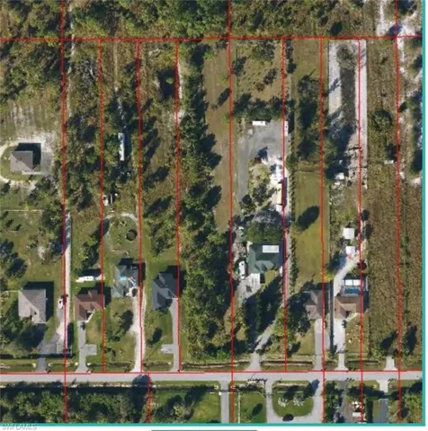 Aerial overview of property's location with property parcel outlined