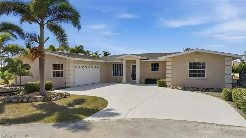 Single story home featuring an attached garage, concrete driveway, stucco siding, and roof with shingles - Virtually Edited Image