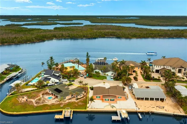 Drone / aerial view featuring a water view virtually enhanced images