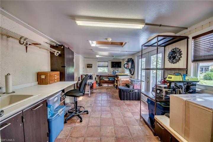 Also with the paved path to the French doors it is a perfect place to park your Golf Cart