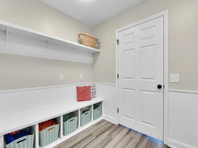 Mudroom featuring light wood-type flooring