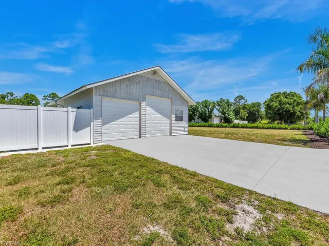 Garage with a lawn