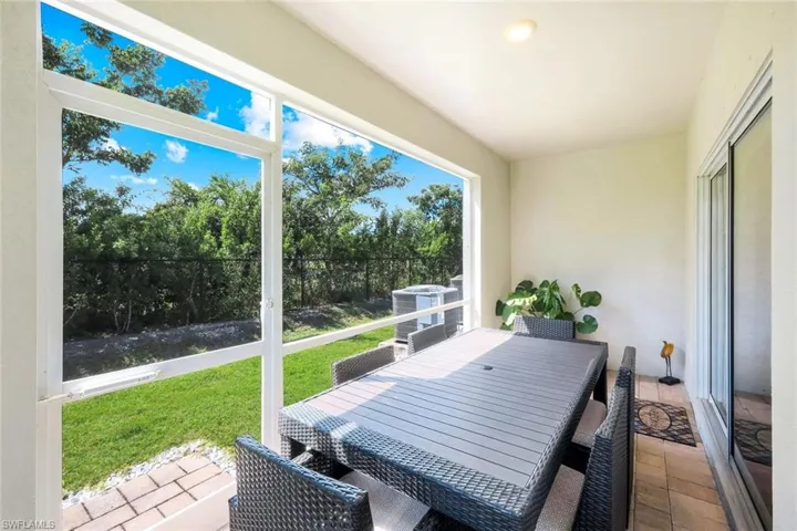 Sunroom with outdoor dining space