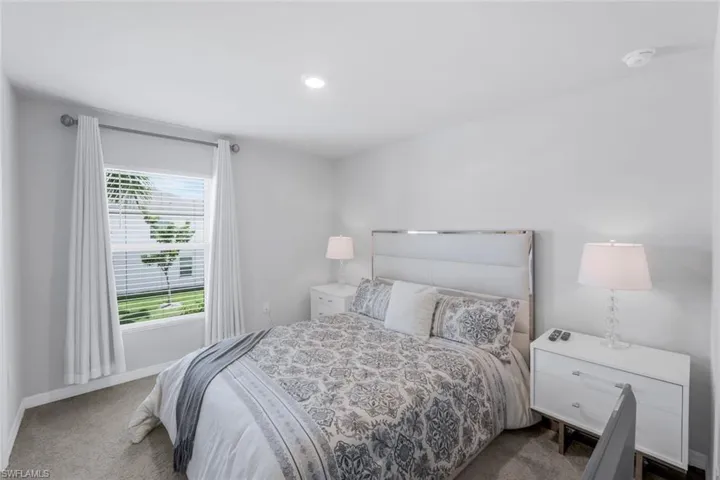 Bedroom with carpet flooring and recessed lighting