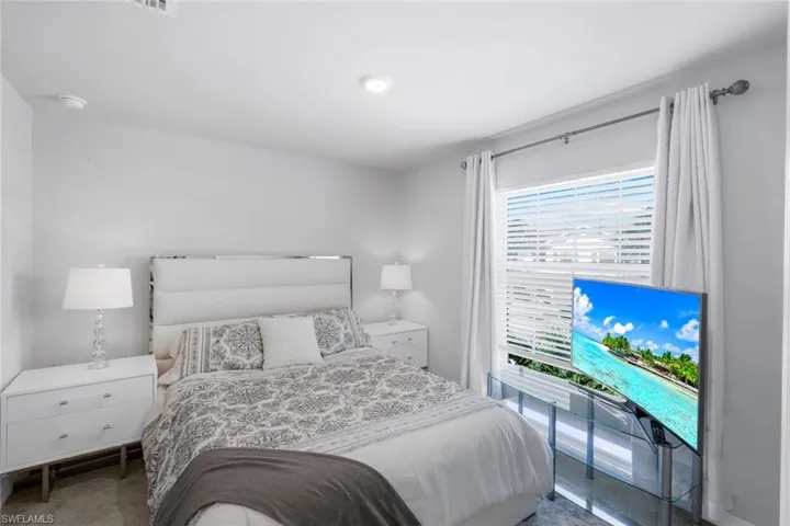 Bedroom with carpet flooring