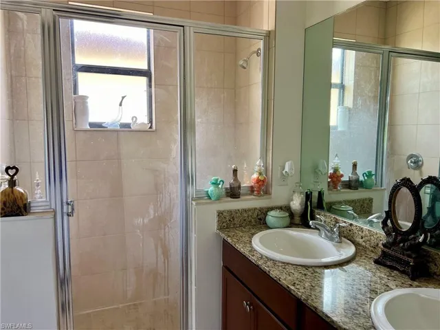 Master bath with shower and dual sink