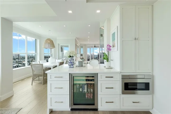 Beverage/wine cooler and drawer microwave.