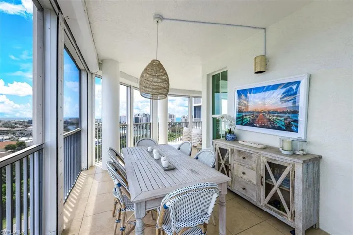 Expansive lanai with outdoor dining.