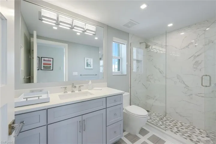 Guest suite with en-suite bath room.  Stunning tile flooring.