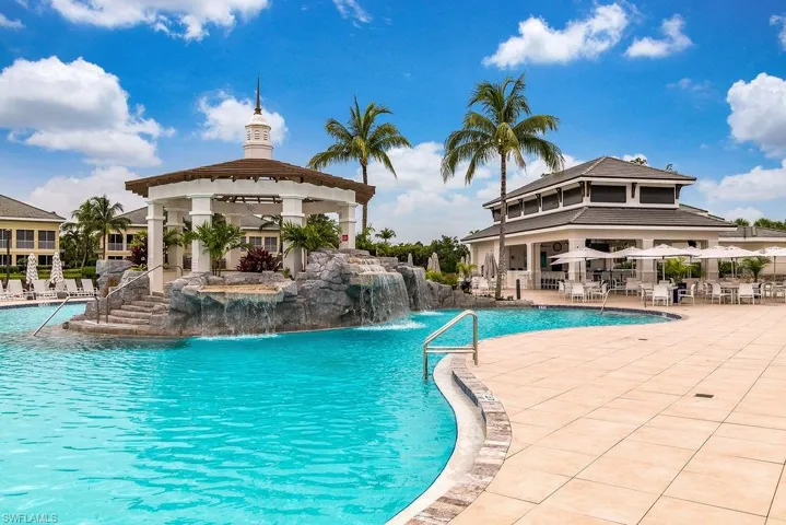 Resort pool with hot tub.