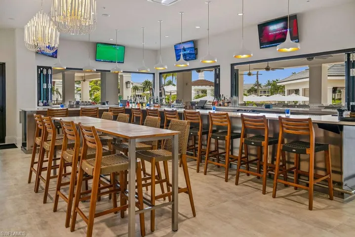 Indoor outdoor bar at the Sand Bar. Watch your favorite sports team.
