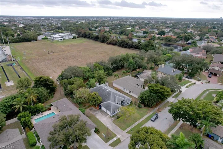 Aerial view of residential area with a large body of water