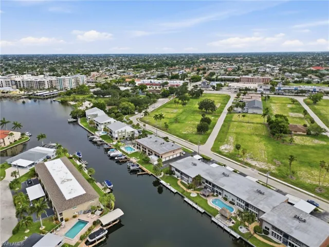 Waterfront community featuring multiple properties with private boat docks and direct canal access