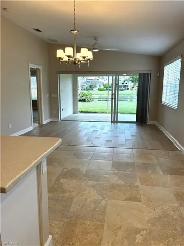 Open Kitchen/Dining with new light fixtures