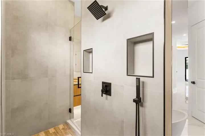 TILED WALKTHROUGH SHOWER w/ RAINFALL, HEAD & HANDHELD SHOWER HEADS