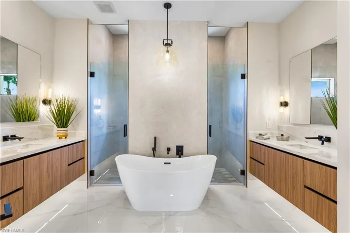 CUSTOM FLOATING VANITIES w/ undercabinet lights, wall mounted faucets & QUARTZ COUNTERTOP