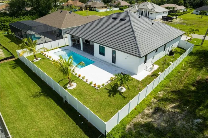 GORGEOUS NEWLY CONSTRUCTED HOME invites you to EMBRACE SWFL LIFESTYLE!