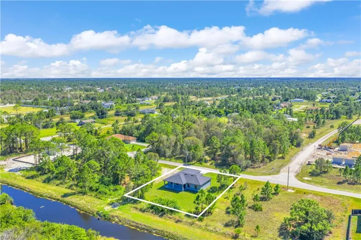 Aerial view of property's location featuring property parcel outlined