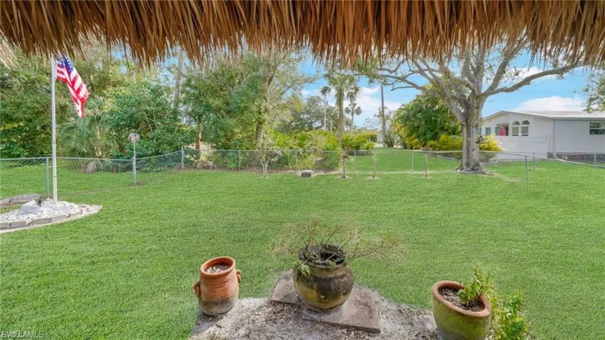 View of fenced backyard