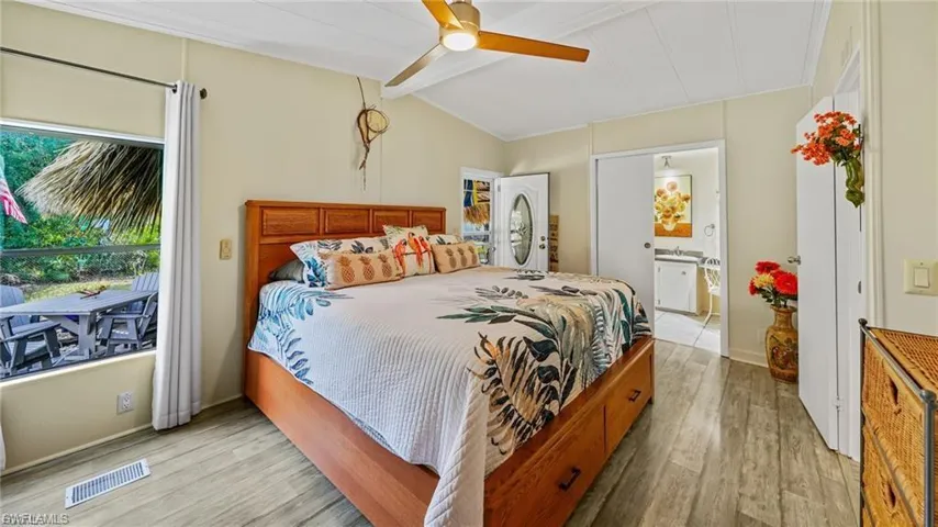 Big and beautifully decorated master bedroom.