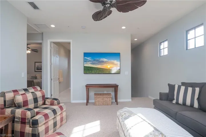 Living room with light carpet