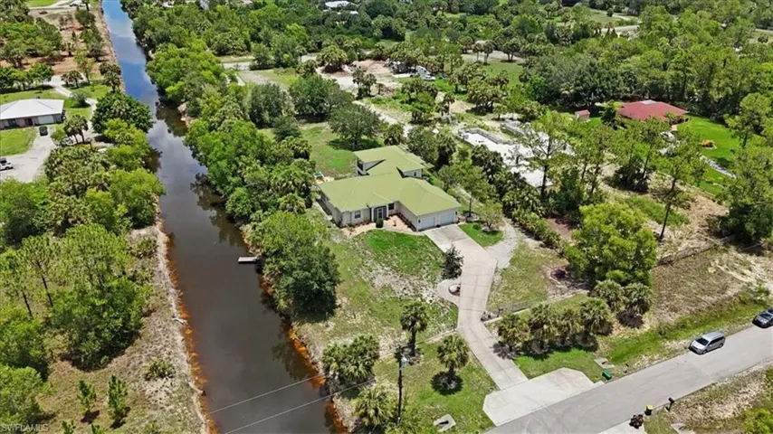 Bird's eye view of a large body of water and a tree filled landscape