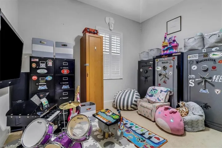 Bedroom featuring carpet floors