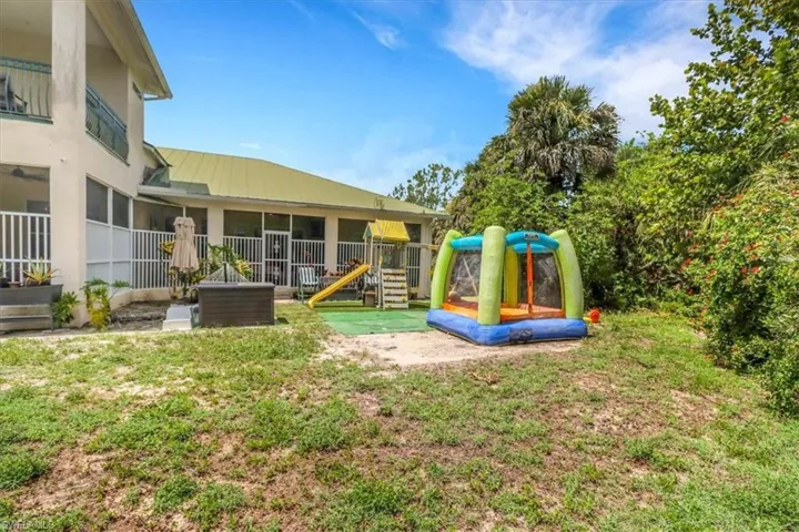 View of green lawn with a playground