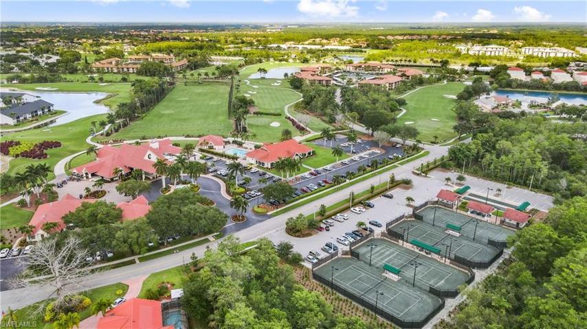 Countryside Drive with view of golf course, clubhouse and tennis courts in foreground