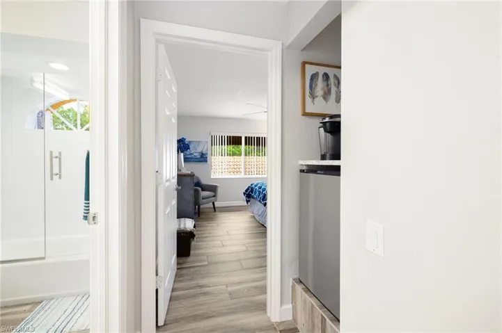 Corridor featuring light hardwood / wood-style flooring