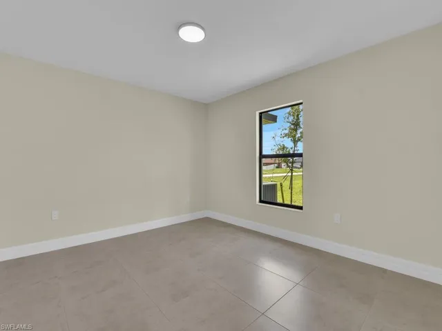 View of tiled empty room